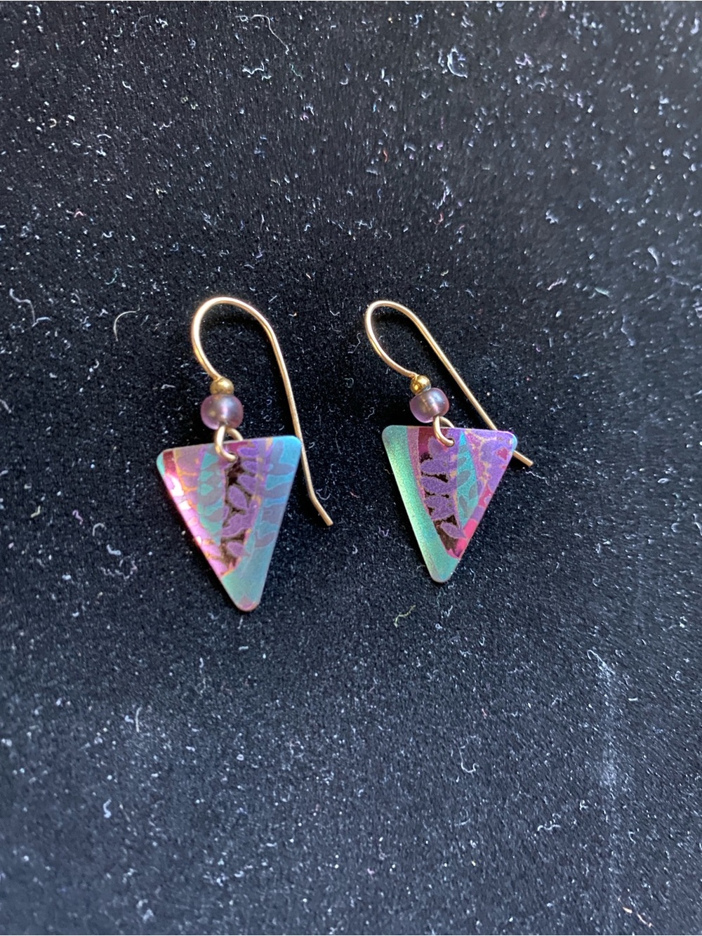 Holly Yashi signed dainty earrings in metal